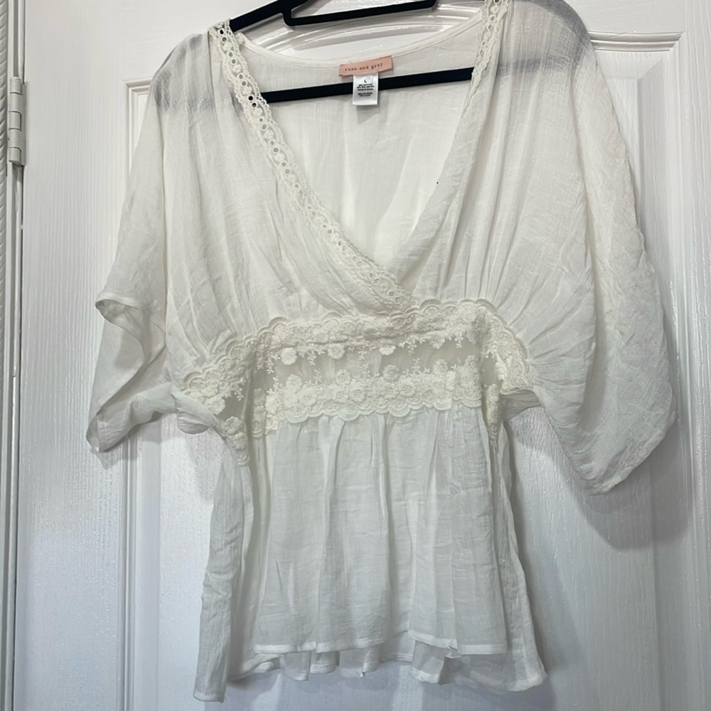 Wide width sleeve with embroidery in busy line and mid section